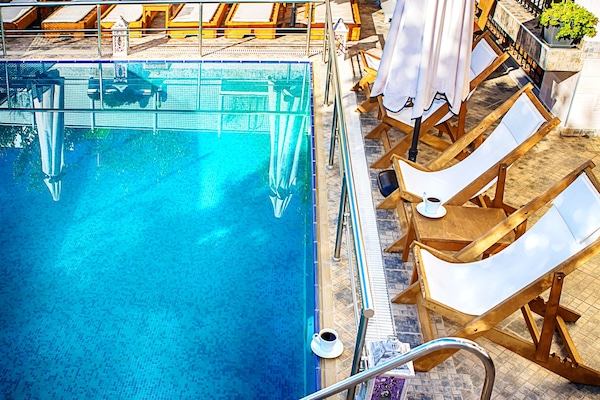 Outdoor pool, pool umbrellas, pool loungers