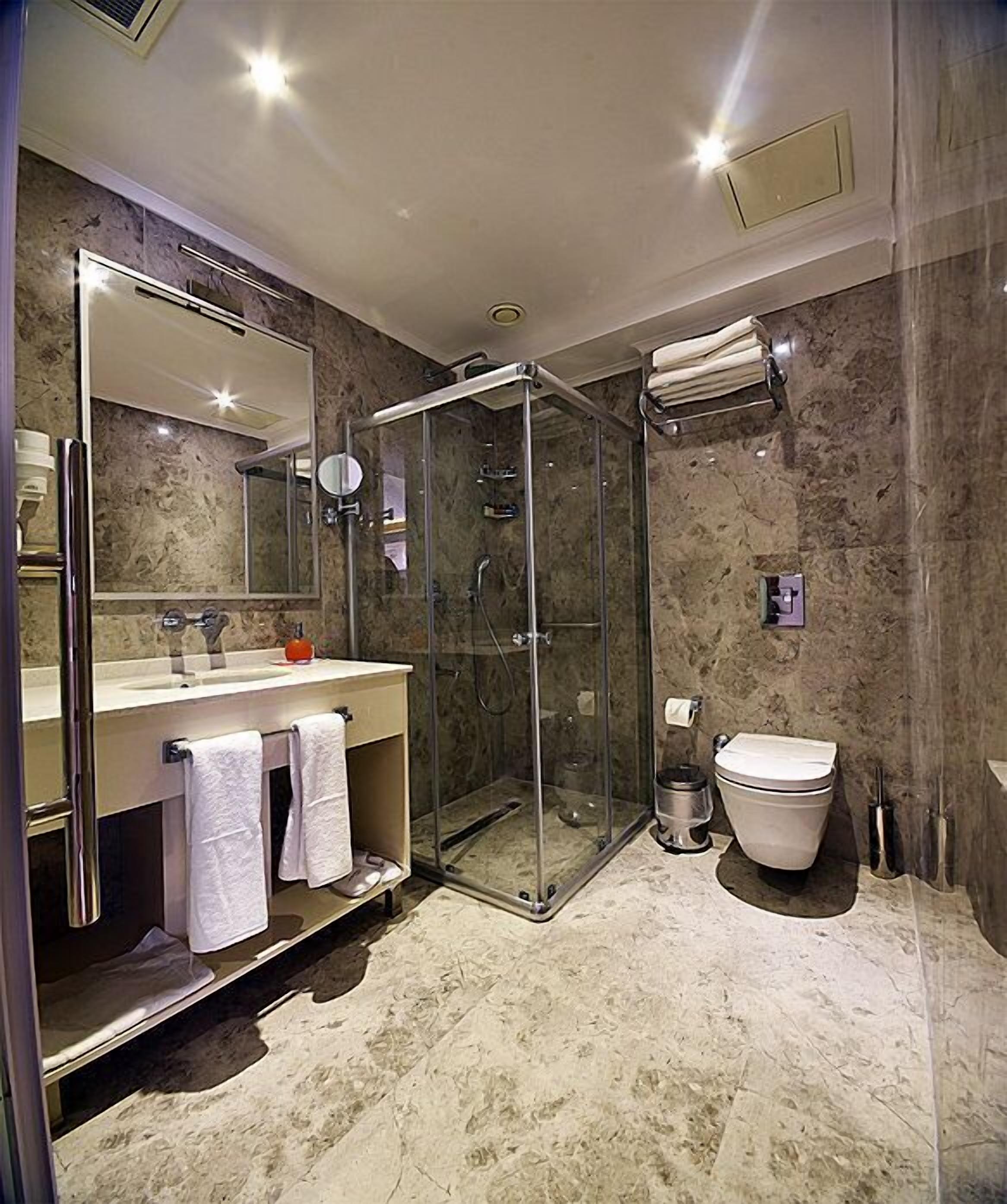 shower, free toiletries, hair dryer, slippers