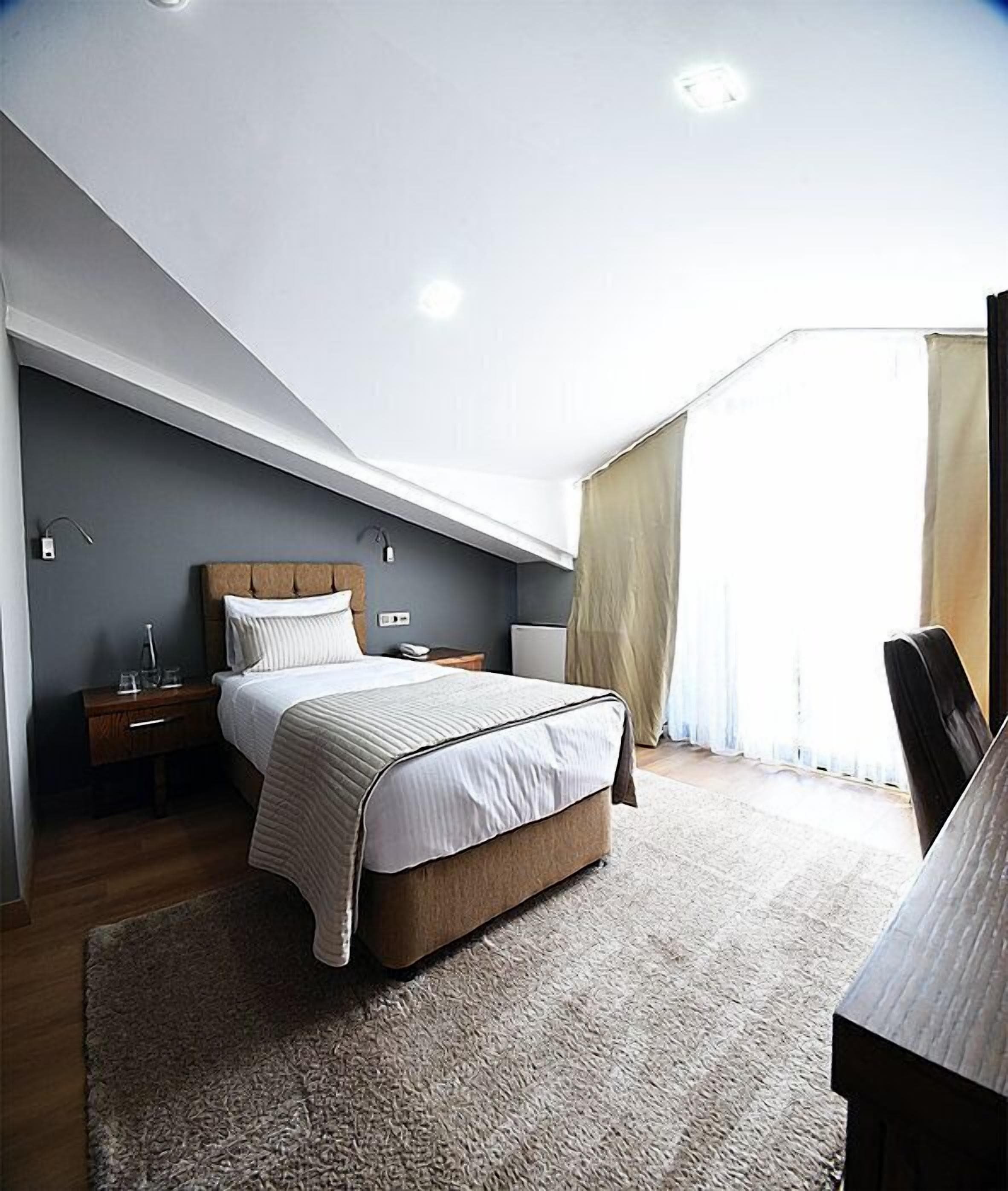 single room (attic) | egyptian cotton sheets, premium bedding, minibar, in-room safe