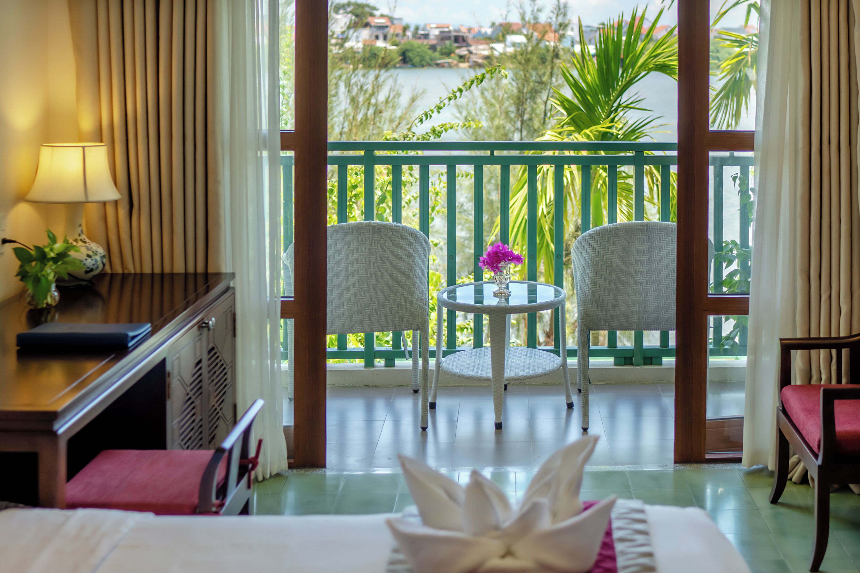 deluxe room, balcony, river view | view from property