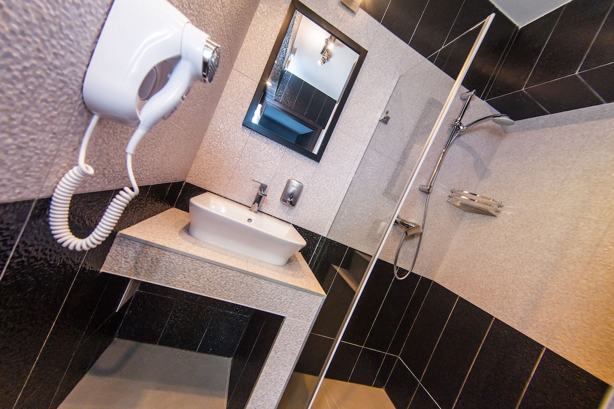 shower, free toiletries, hair dryer, bathrobes