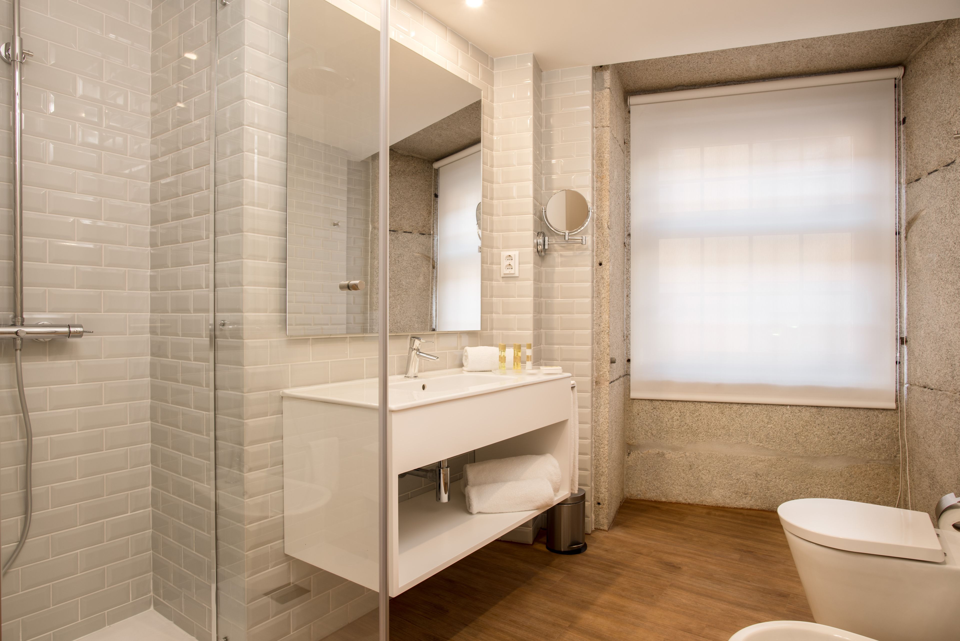 shower, eco-friendly toiletries, hair dryer, towels