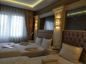 Deluxe Triple Room, 1 Bedroom, Non Smoking | Premium bedding, in-room safe, desk, blackout drapes - Sun Comfort Hotel (Istanbul)