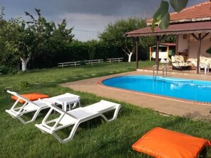 Outdoor pool, pool umbrellas, pool loungers