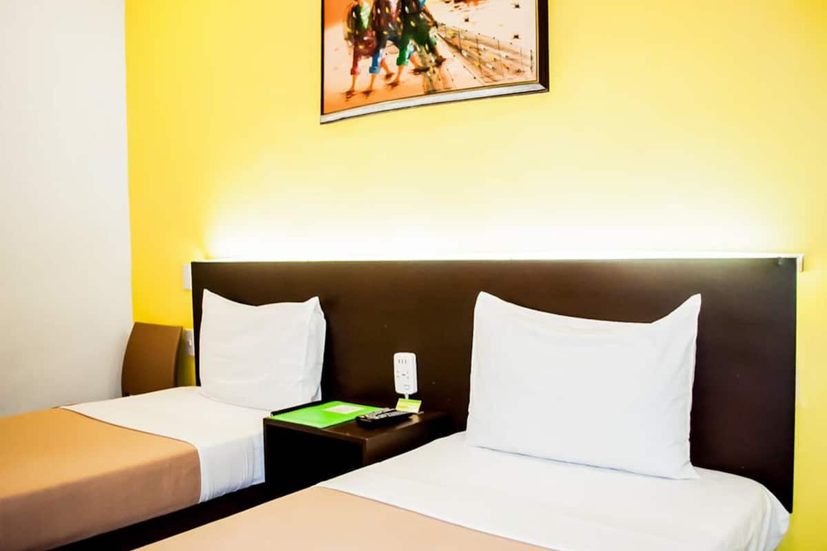 deluxe twin room | in-room safe, desk, laptop workspace, iron/ironing board