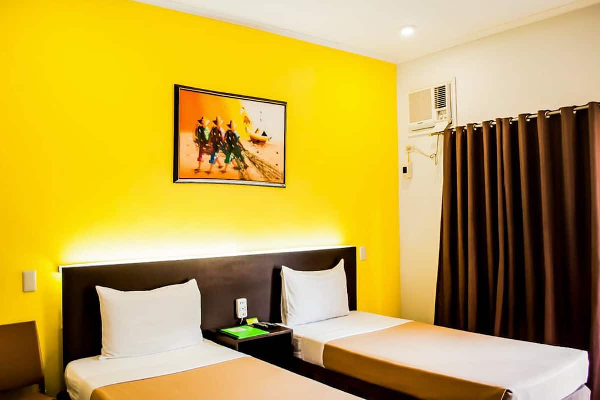 deluxe twin room | in-room safe, desk, laptop workspace, iron/ironing board