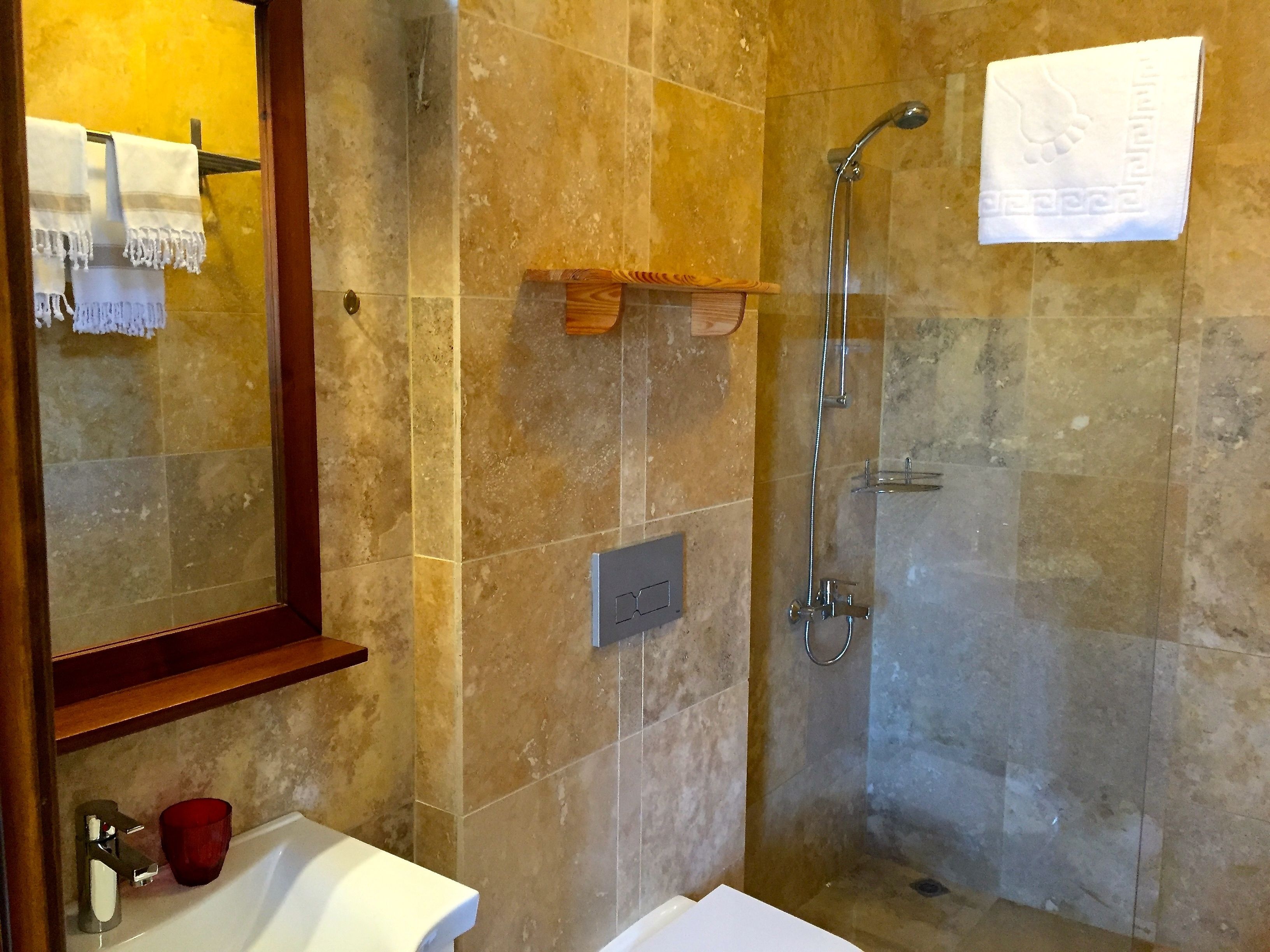family quadruple room | bathroom | shower, free toiletries, hair dryer, slippers