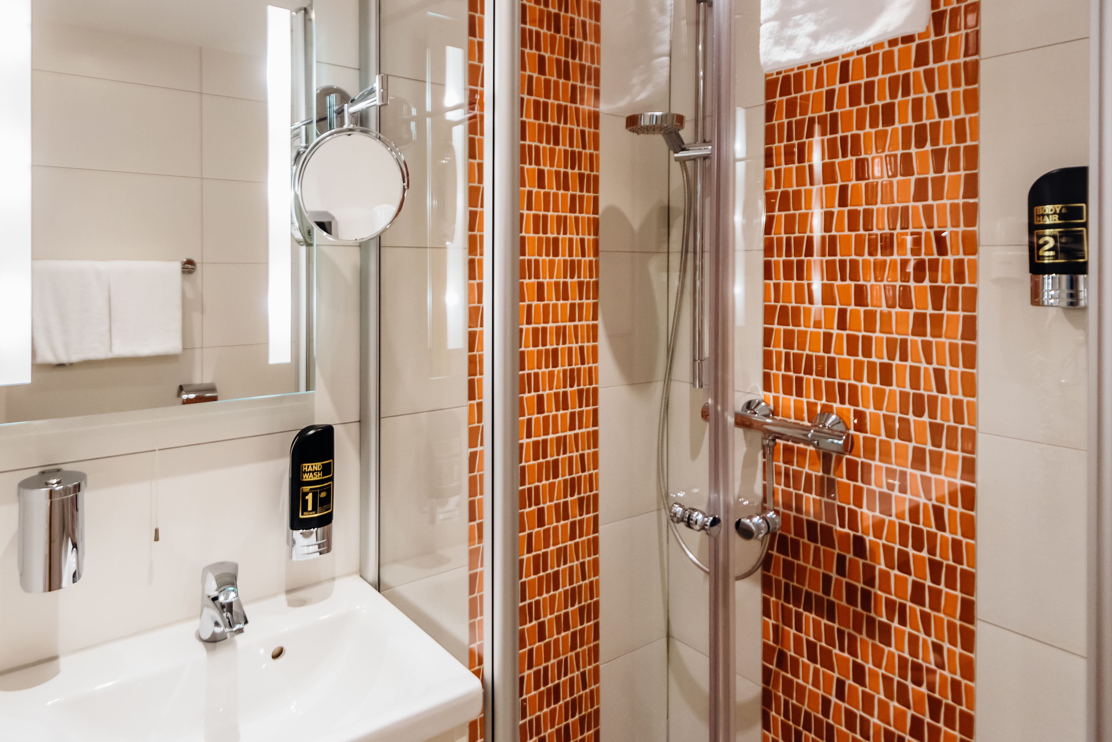 standard double room | bathroom | hair dryer, towels, soap, toilet paper