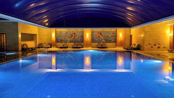 Indoor pool, outdoor pool, pool umbrellas, sun loungers