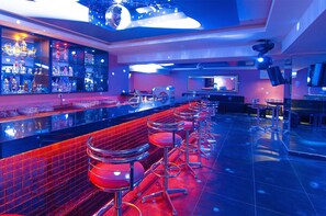 3 bars/lounges, poolside bar, beach bar