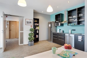 Habitación cuádruple económica, baño compartido | Cocina compartida