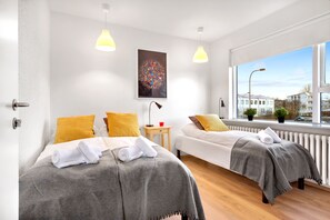 Habitación triple, baño compartido | Cortinas opacas, sistema de insonorización, cunas (de pago)