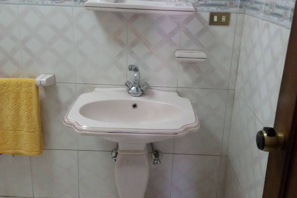 double room, river view | bathroom sink