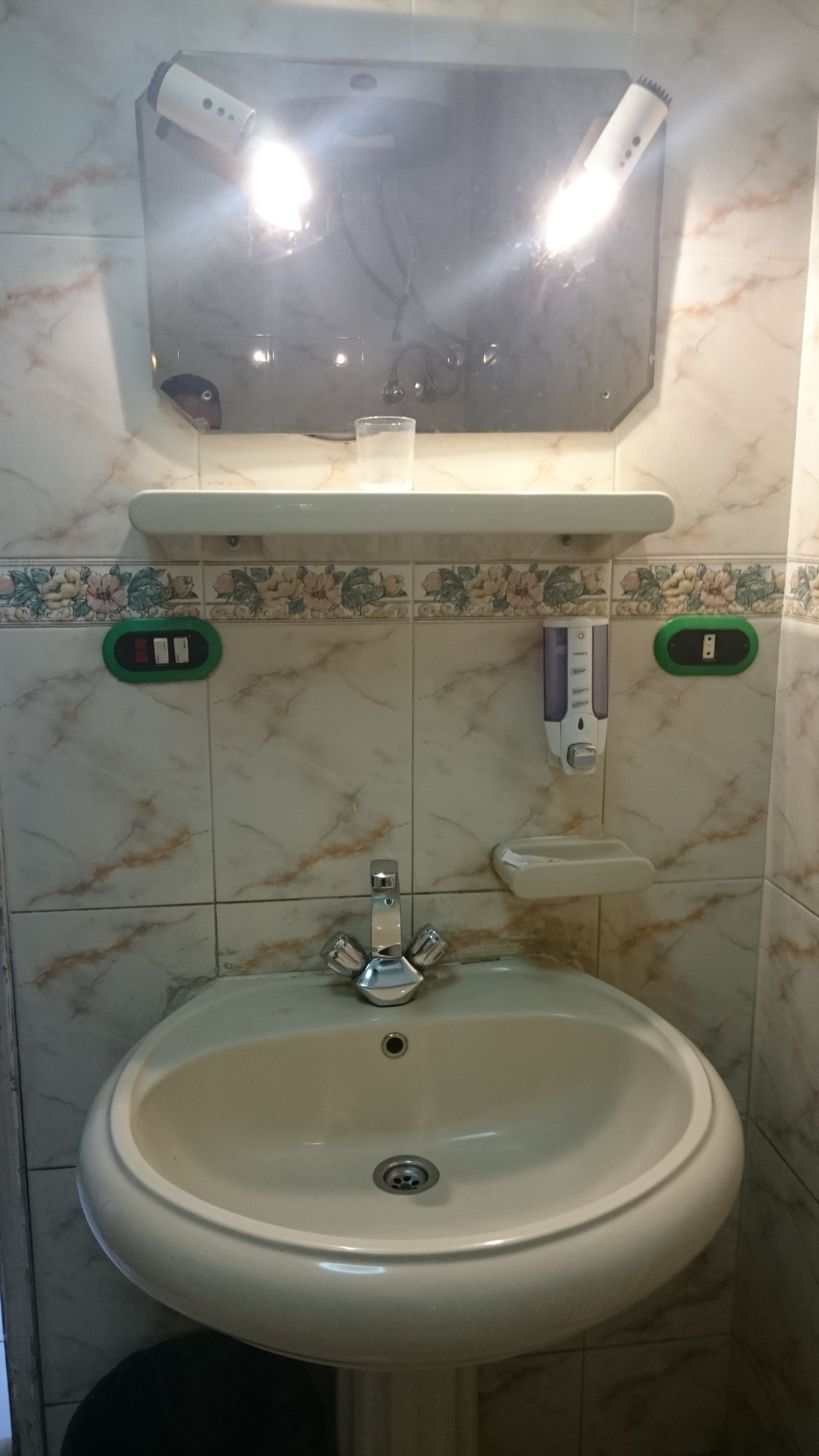 double room, river view | bathroom sink