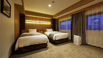Deluxe Twin Room, Non Smoking | In-room safe, desk, free WiFi, bed sheets