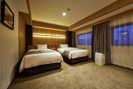 Deluxe Twin Room, Non Smoking | In-room safe, desk, free WiFi, bed sheets