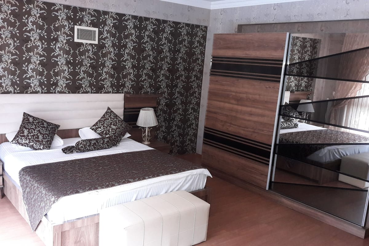 Minibar, desk, blackout drapes, iron/ironing board