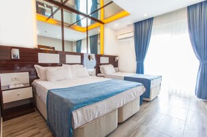 Ropa de cama de alta calidad y minibar 