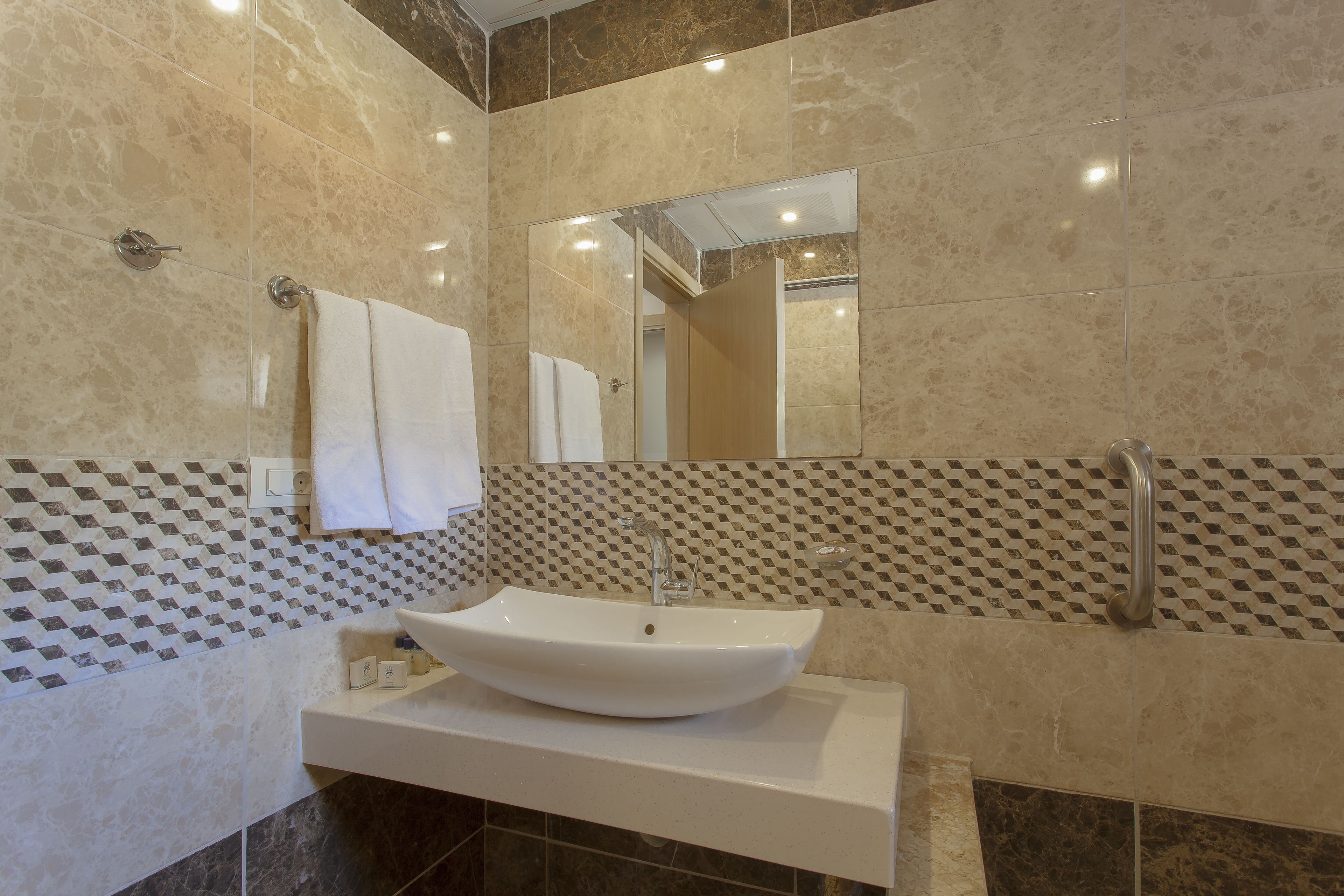 family room | 1 bedroom, premium bedding, minibar, in-room safe