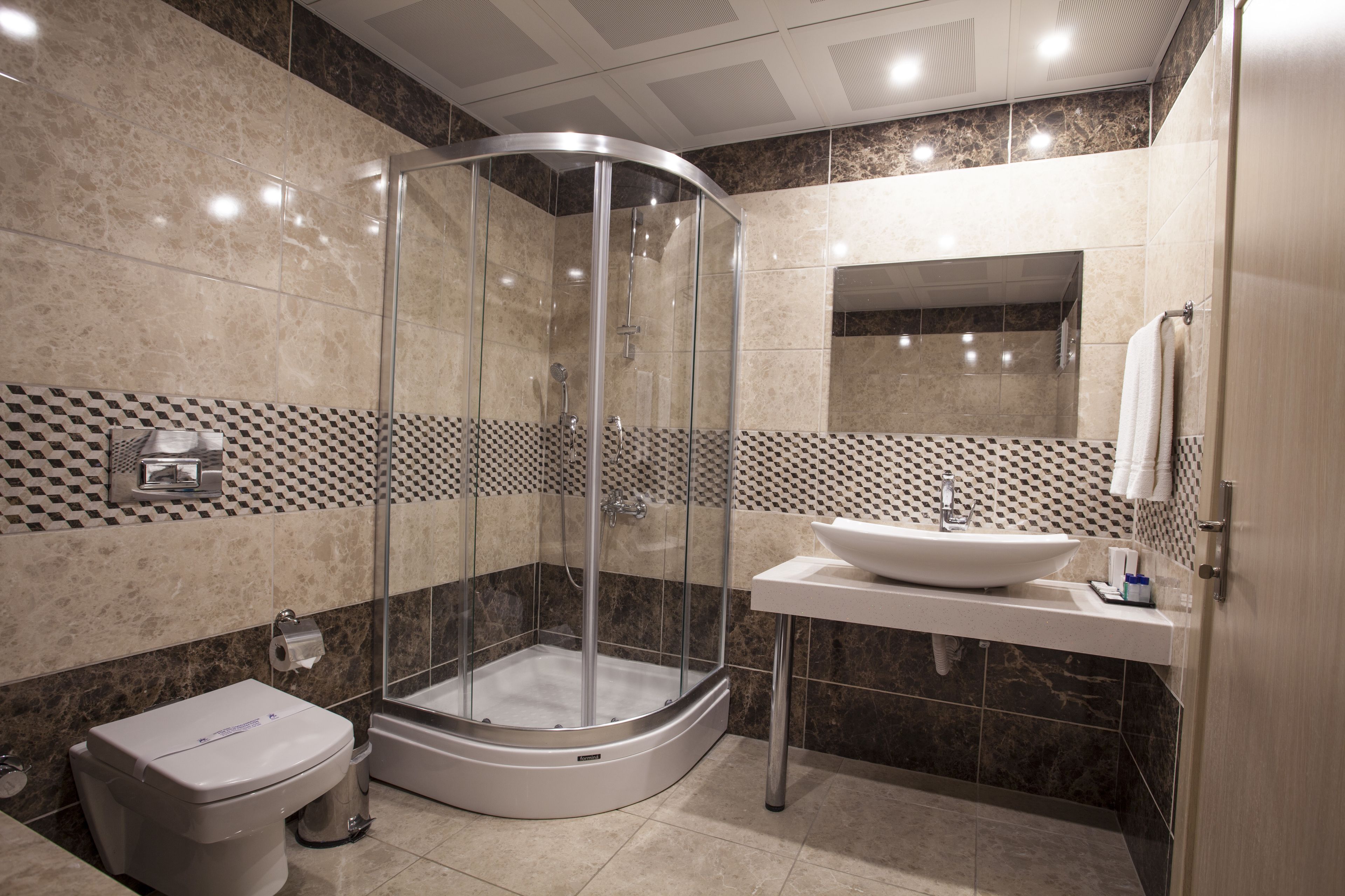 combined shower/bathtub, spring water bathtub, designer toiletries