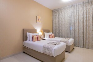 Suite, 2 Schlafzimmer | Zimmersafe, Schreibtisch, Verdunkelungsvorhänge, schallisolierte Zimmer