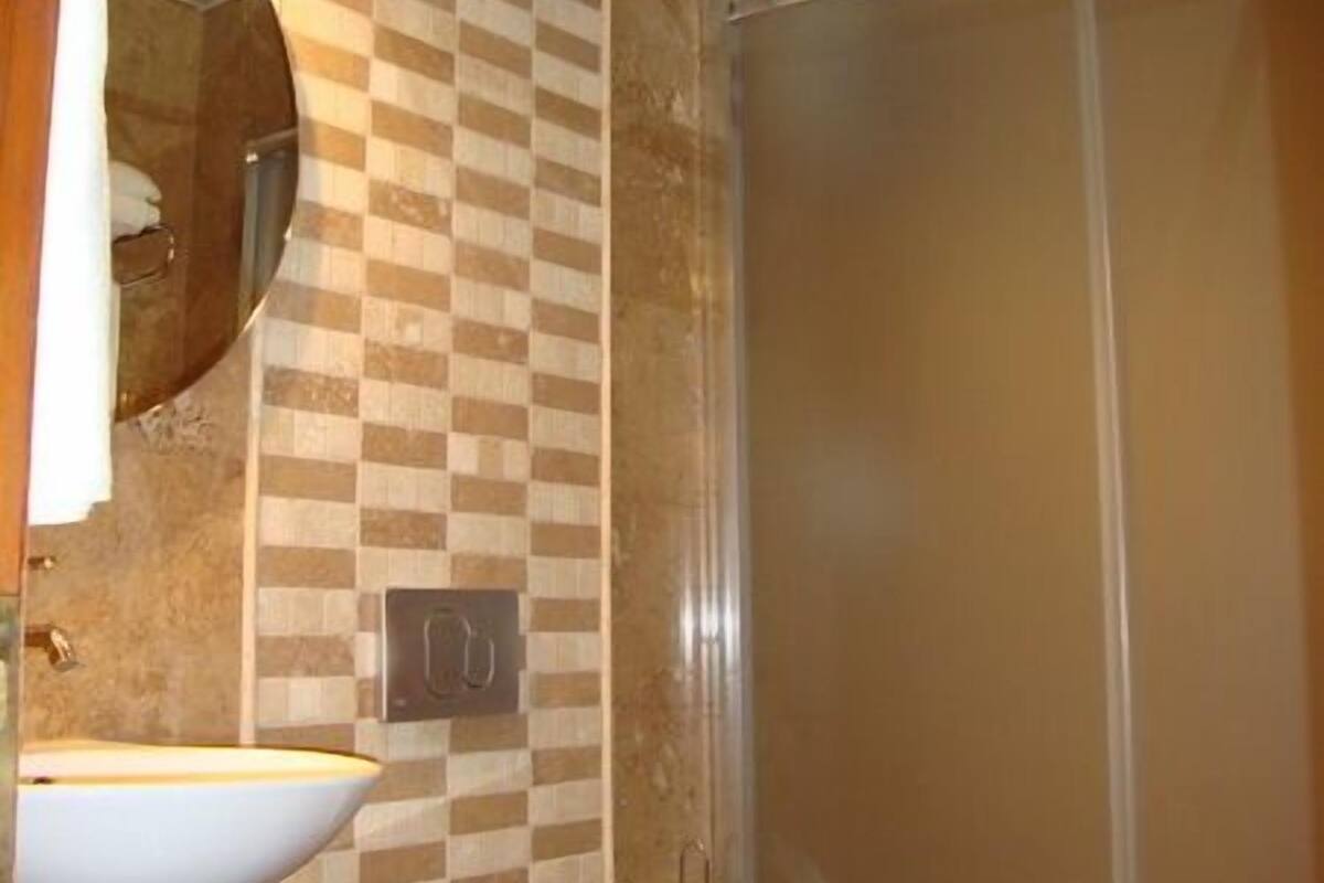 shower, free toiletries, hair dryer, slippers