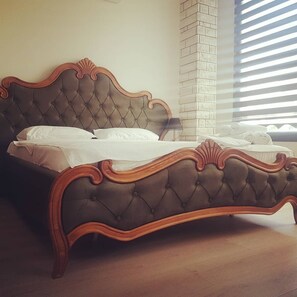 Premium Suite | Minibar, blackout drapes, iron/ironing board, free WiFi