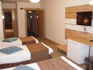 Triple Room (3 Single) | Treatment room
