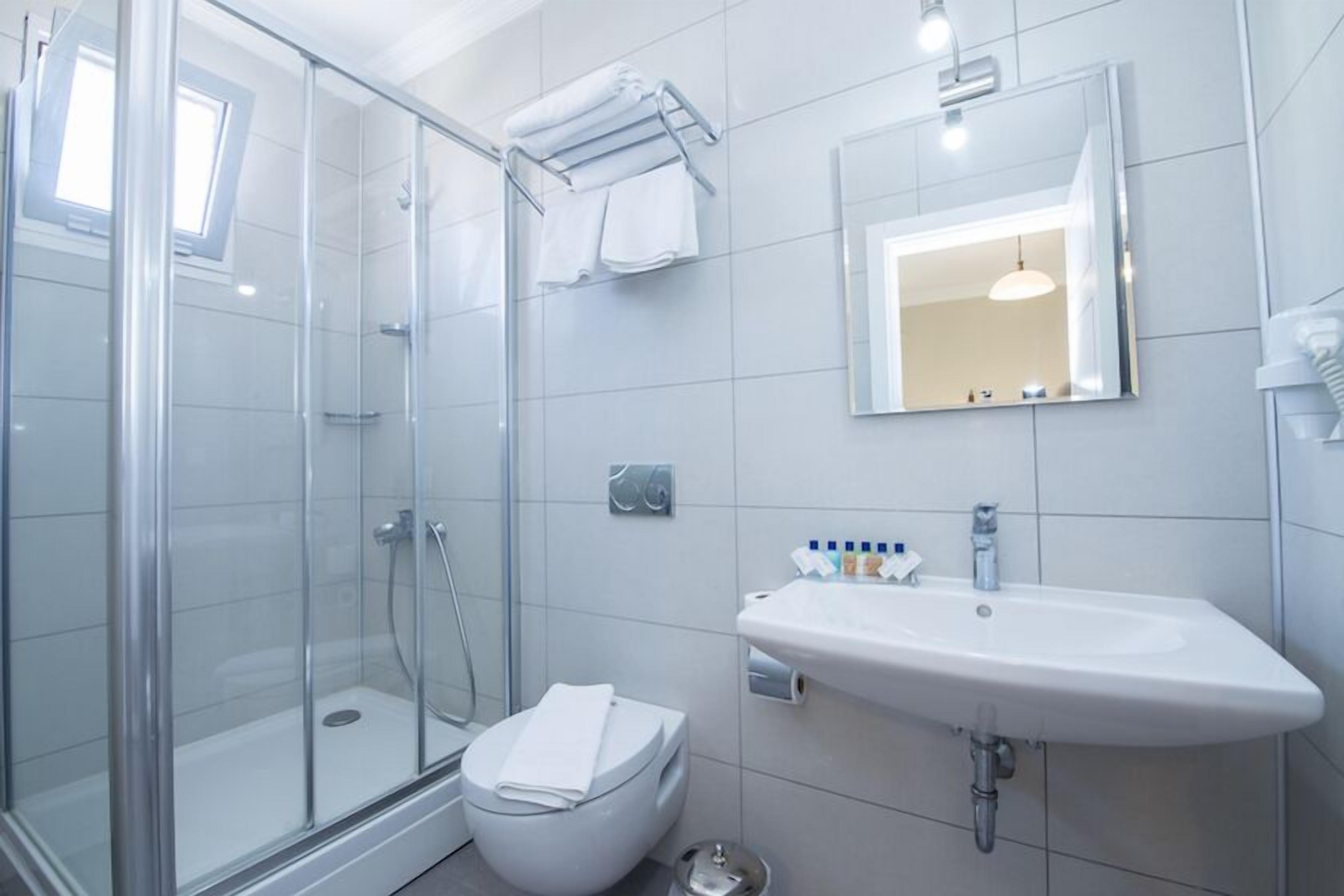 basic double room, garden view | bathroom | shower, free toiletries, hair dryer, slippers