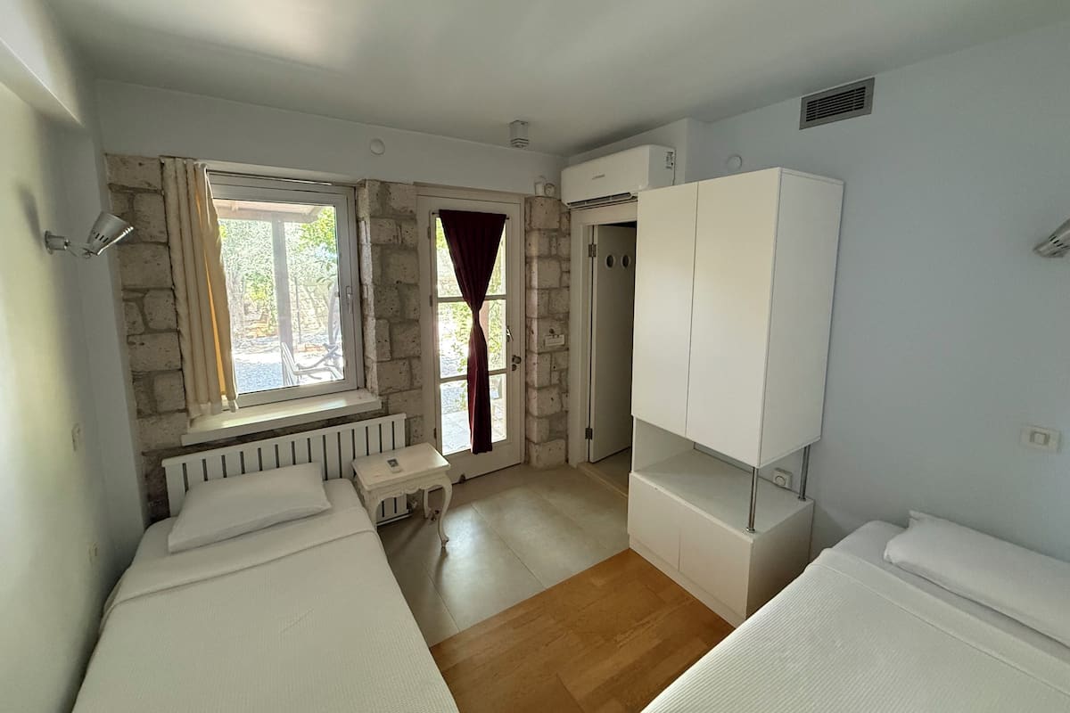 Economy Room | Memory foam beds, in-room safe, soundproofing, WiFi (free)