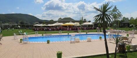 Outdoor pool, pool umbrellas, pool loungers