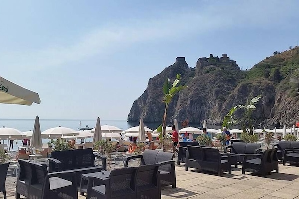 Private beach, sun loungers, beach umbrellas
