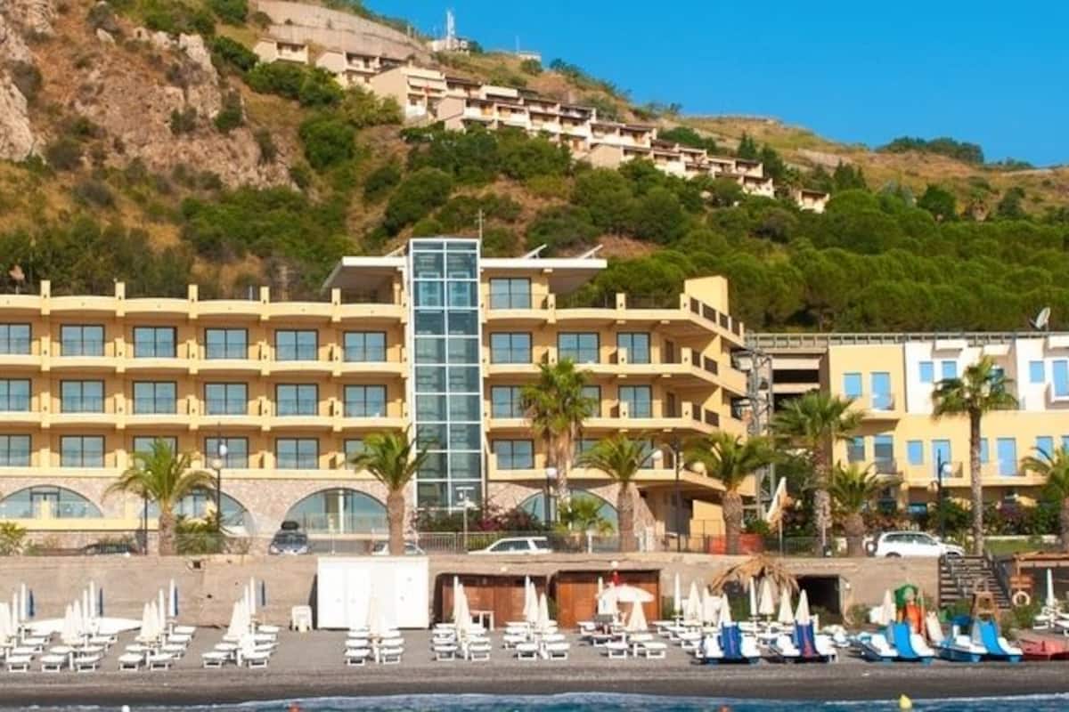 private beach, sun-loungers, beach umbrellas