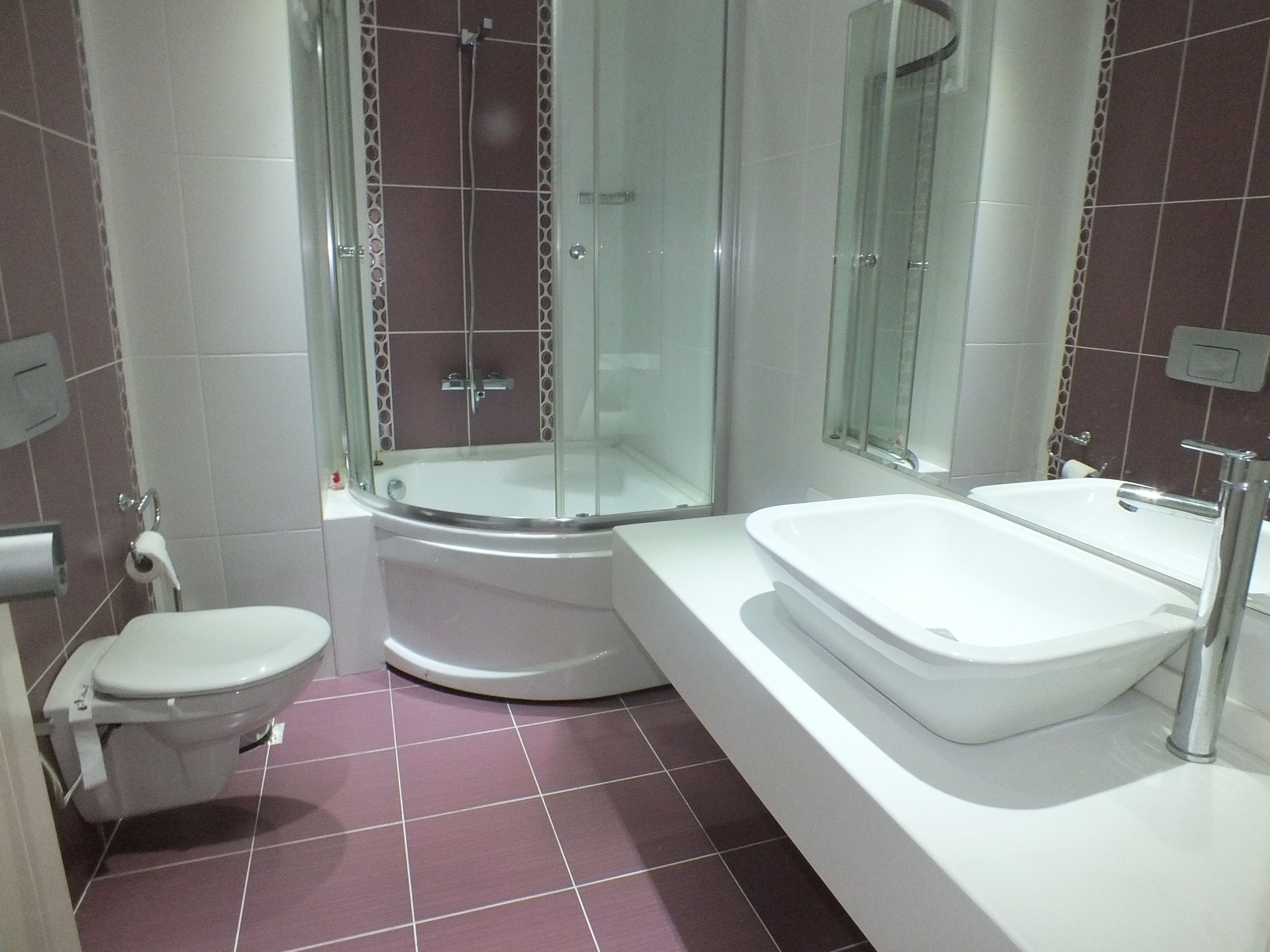 deep-soaking bathtub, free toiletries, hair dryer, slippers