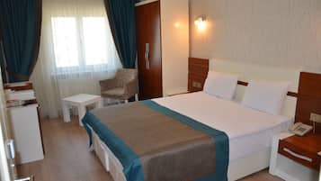 Egyptian cotton sheets, premium bedding, minibar, in-room safe