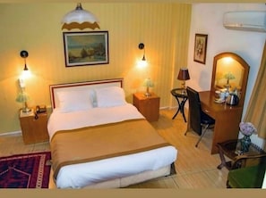 Economy Double Room | Free minibar items, in-room safe, desk, soundproofing