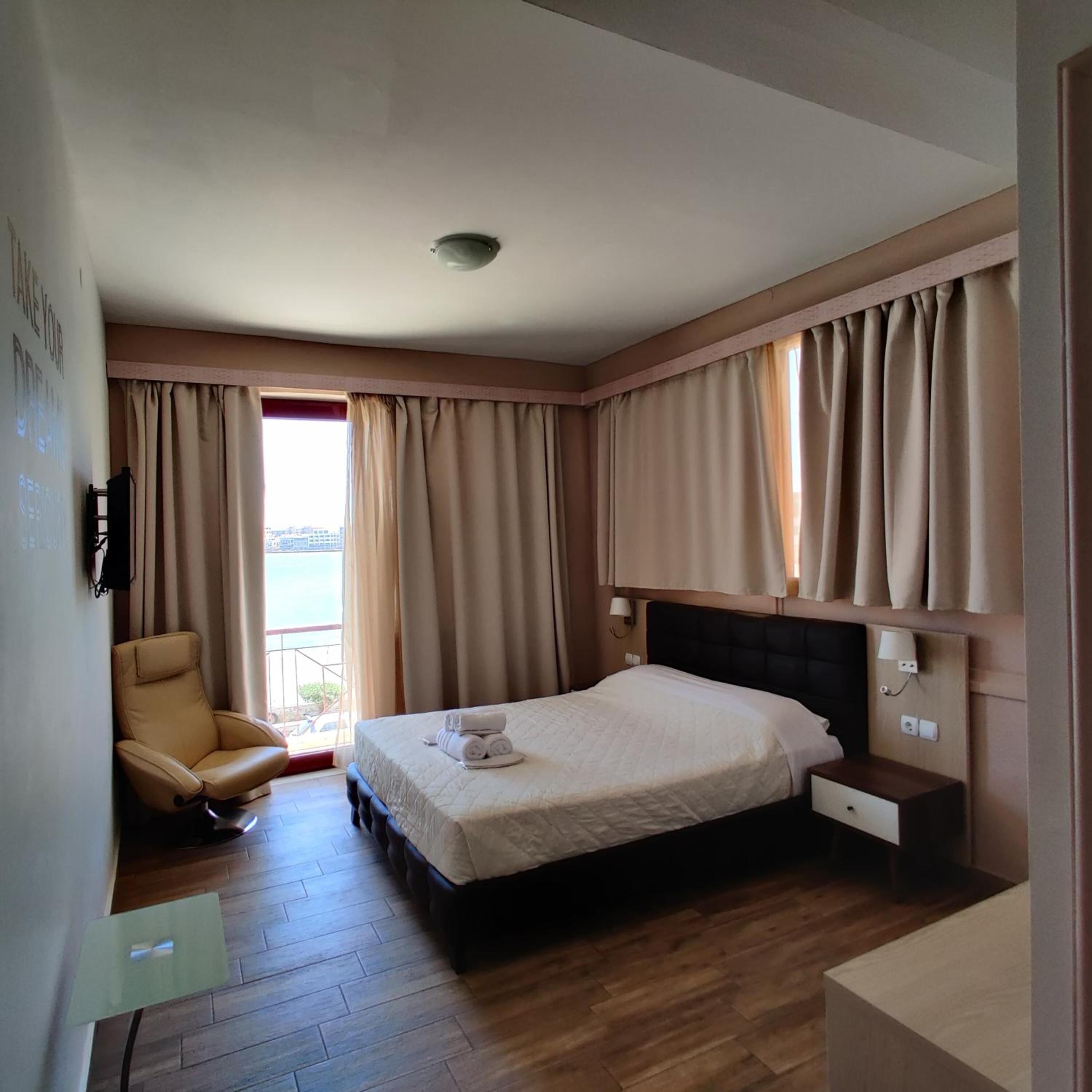 desk, blackout curtains, soundproofing, iron/ironing board