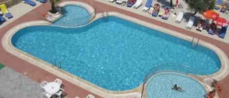 Outdoor pool, open 8:00 AM to 7:30 PM, pool umbrellas, sun loungers