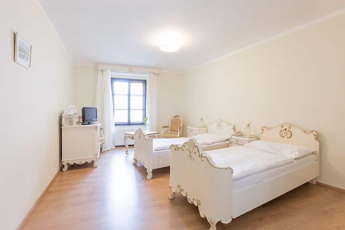 romantic room, city view | premium bedding, desk, blackout curtains, iron/ironing board