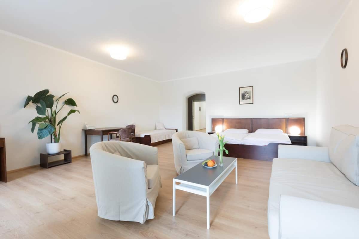 premium bedding, desk, blackout curtains, iron/ironing board