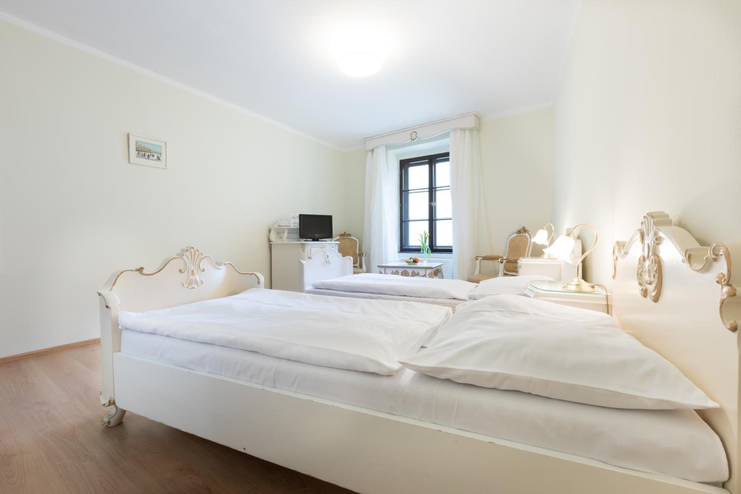 premium bedding, desk, blackout curtains, iron/ironing board