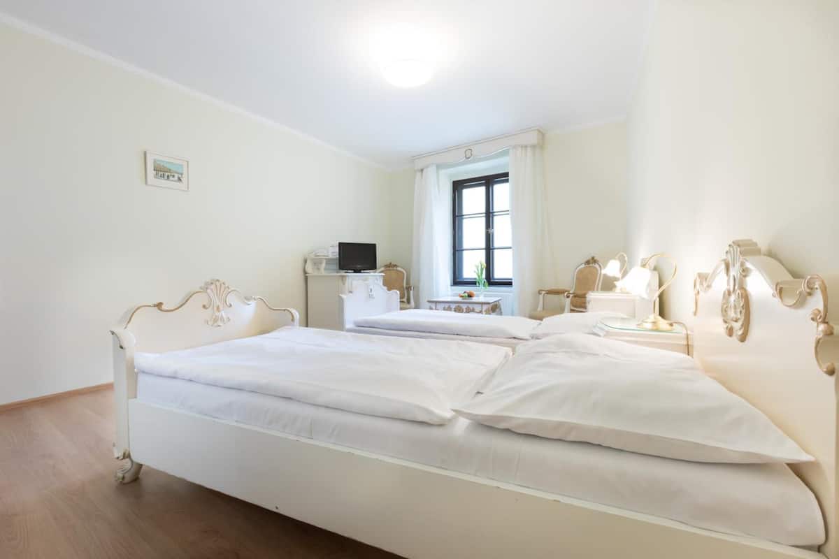 premium bedding, desk, blackout curtains, iron/ironing board