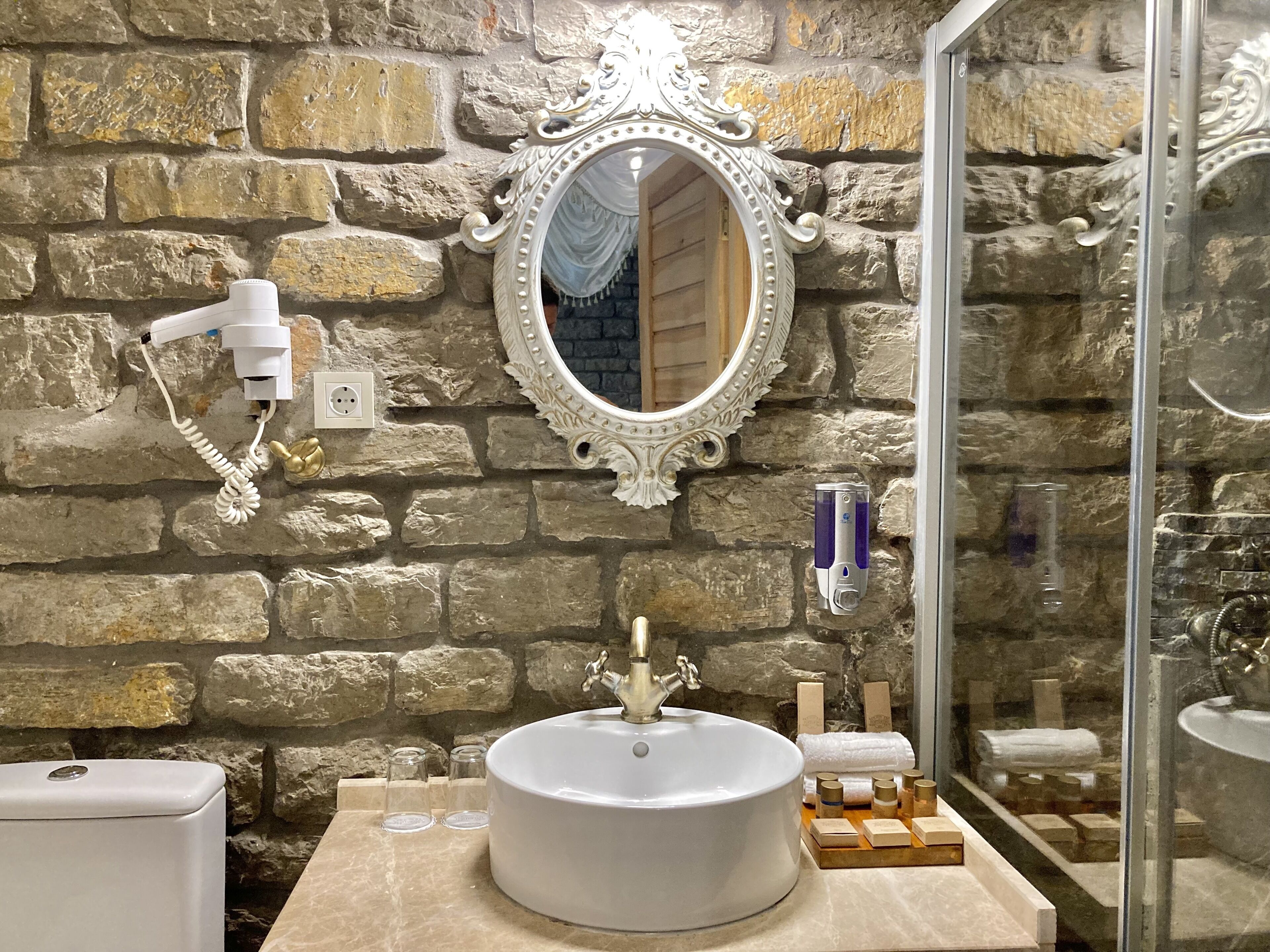 king suite room, garden view | bathroom | shower, rainfall showerhead, hair dryer, slippers