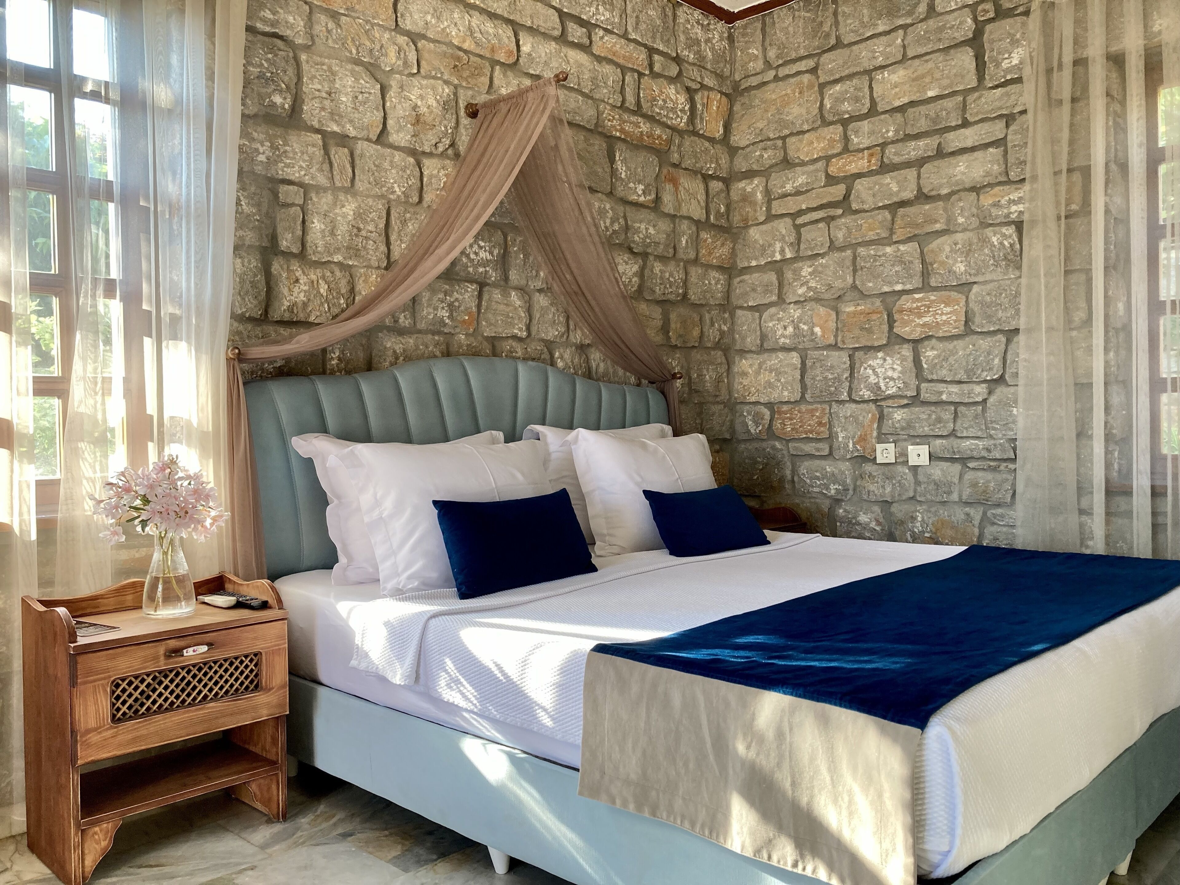 Premium bedding, free minibar items, desk, blackout curtains