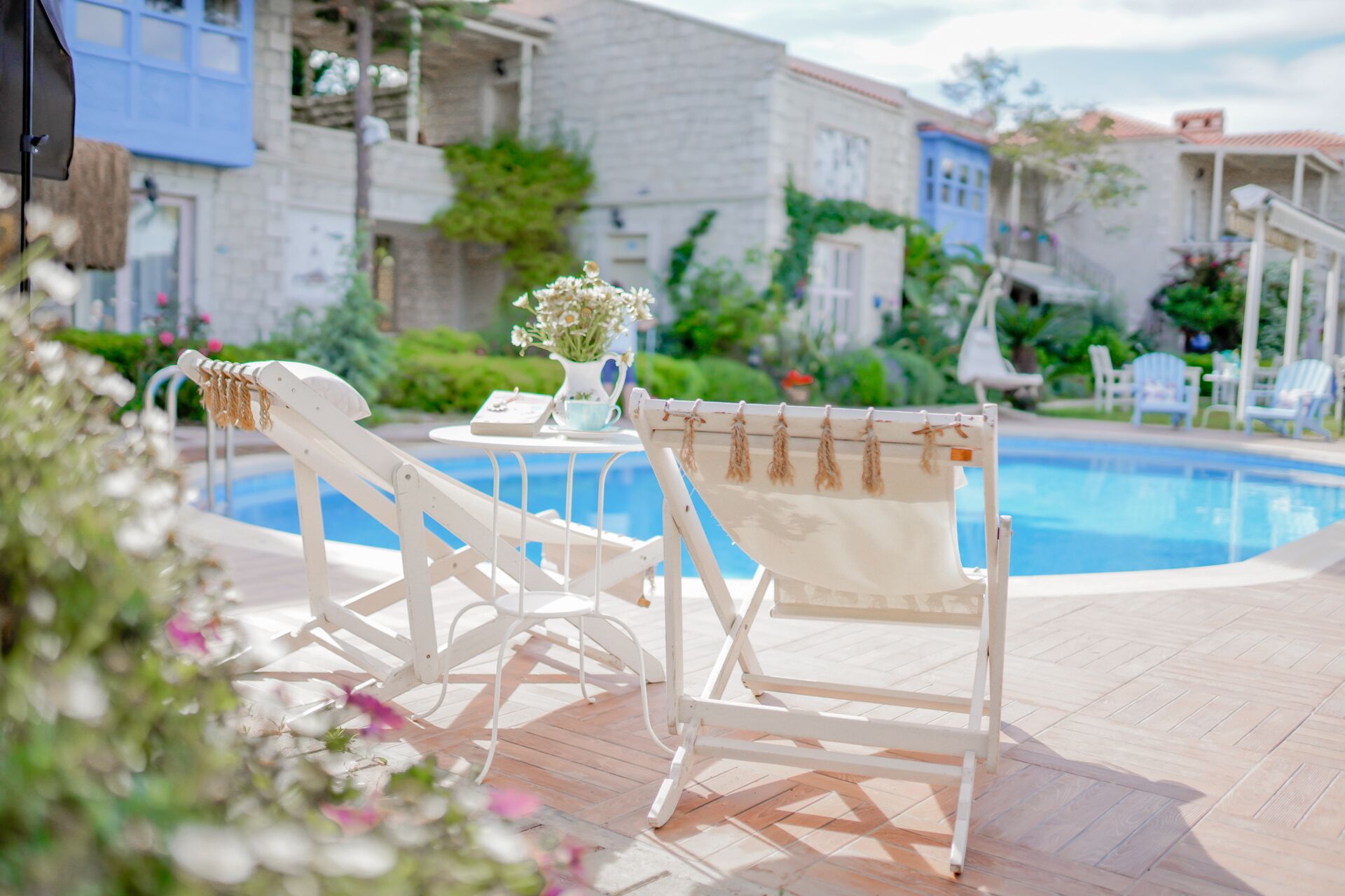 outdoor pool, pool umbrellas, pool loungers
