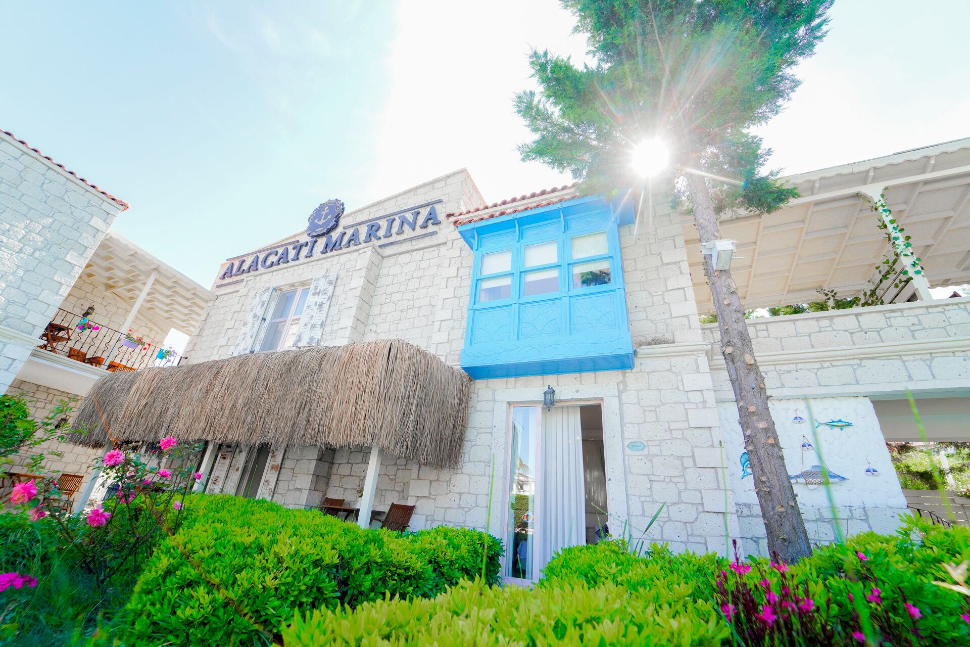 A building with a sign reading "ALAGATI MARINA".
