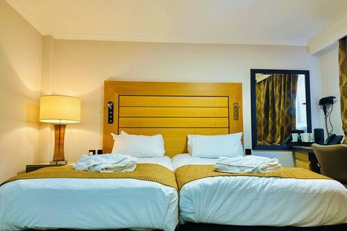 Deluxe Twin Suite | Sábanas italianas Frette y ropa de cama de alta calidad