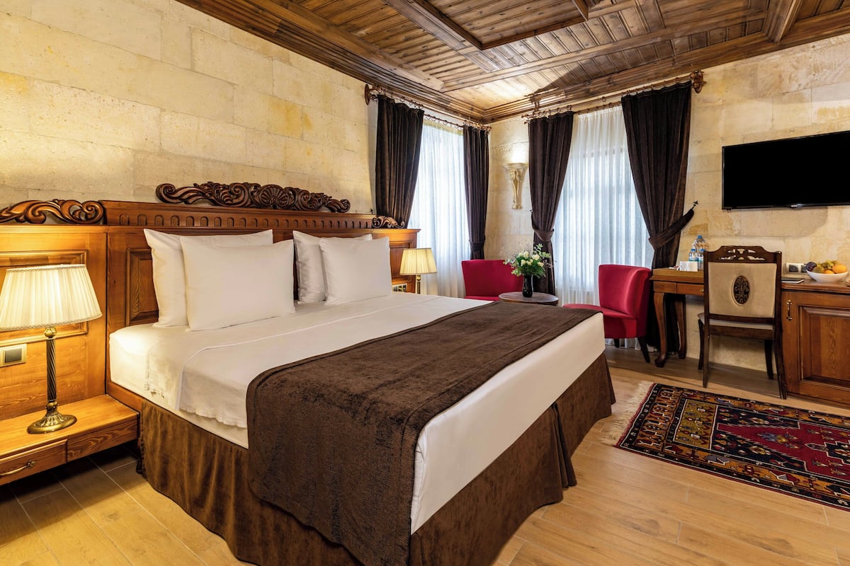 Suite junior | Ropa de cama de alta calidad, colchones Select Comfort, minibar