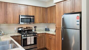 Luxury Apartment, 2 Bedrooms | Private kitchen | Full-size fridge, microwave, oven, stovetop