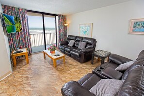 2 Bedroom Oceanfront Condo | Living area | Flat-screen TV - Condos by Beach Vacations North (Myrtle Beach)